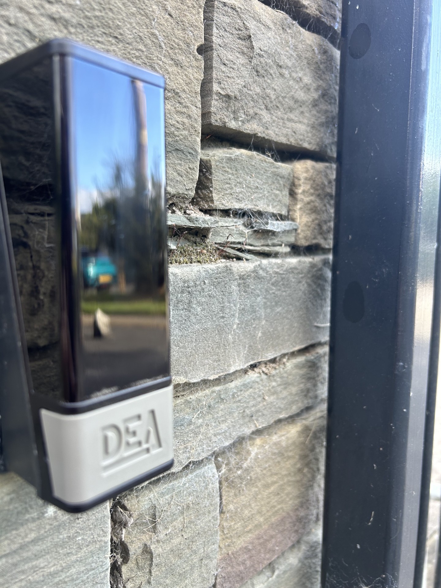 DEA safety photocell mounted on a stone pillar by KLR Design Limited
