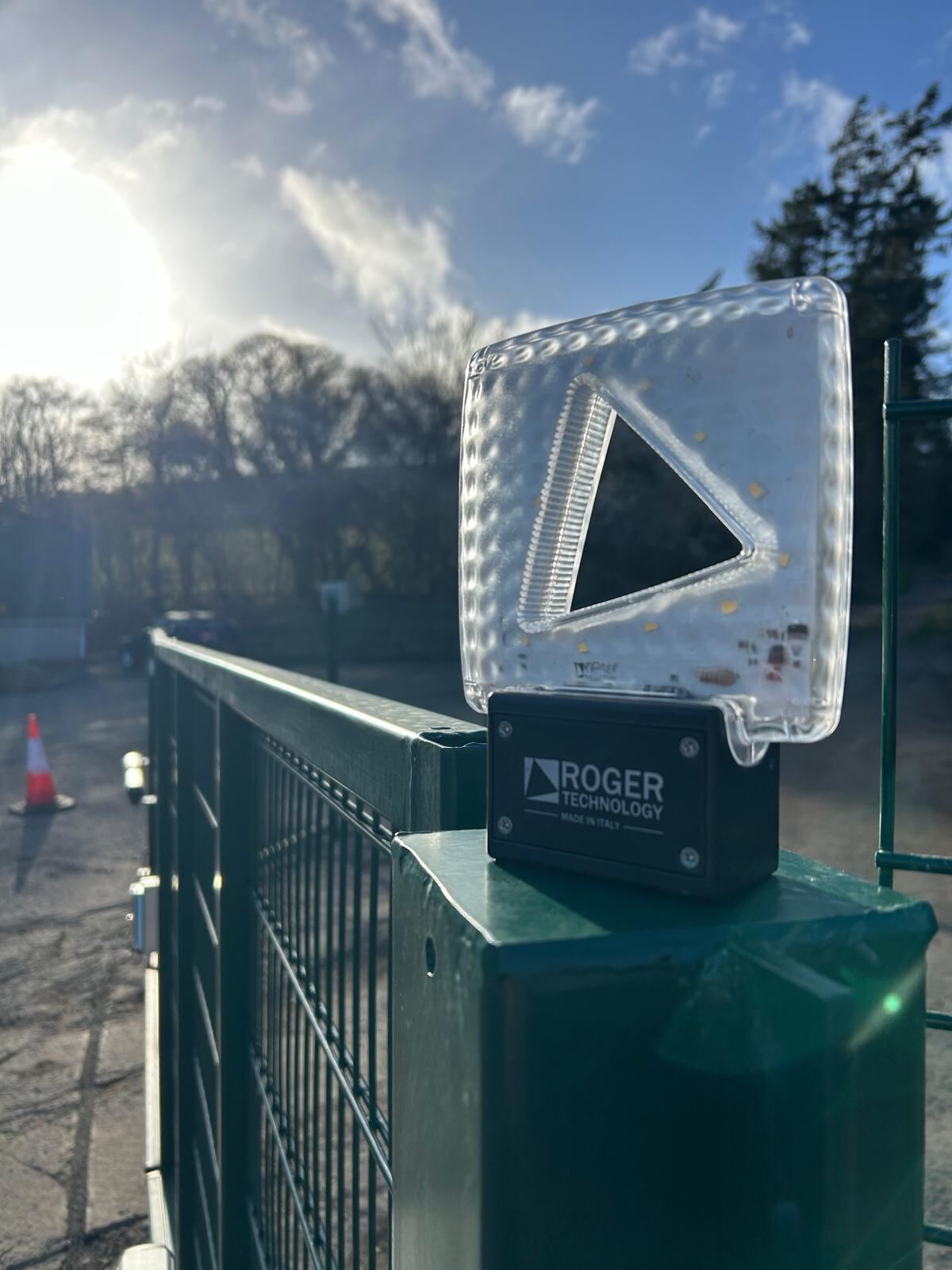 Roger Technology LED flashing warning light mounted on a commercial swing gate installation by KLR Design Limited