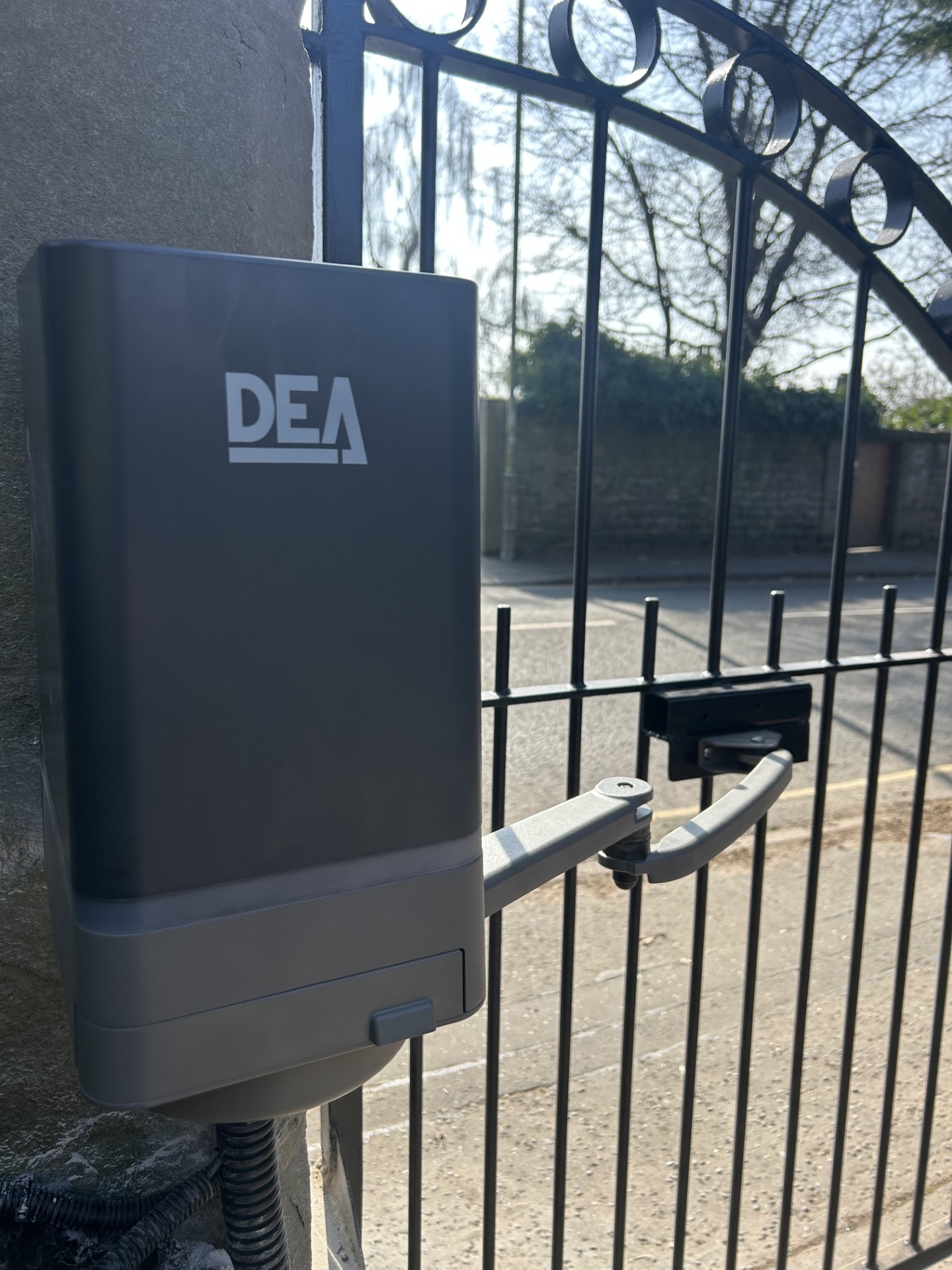 DEA swing gate arm motor fitted to wrought iron gates by KLR Design Limited