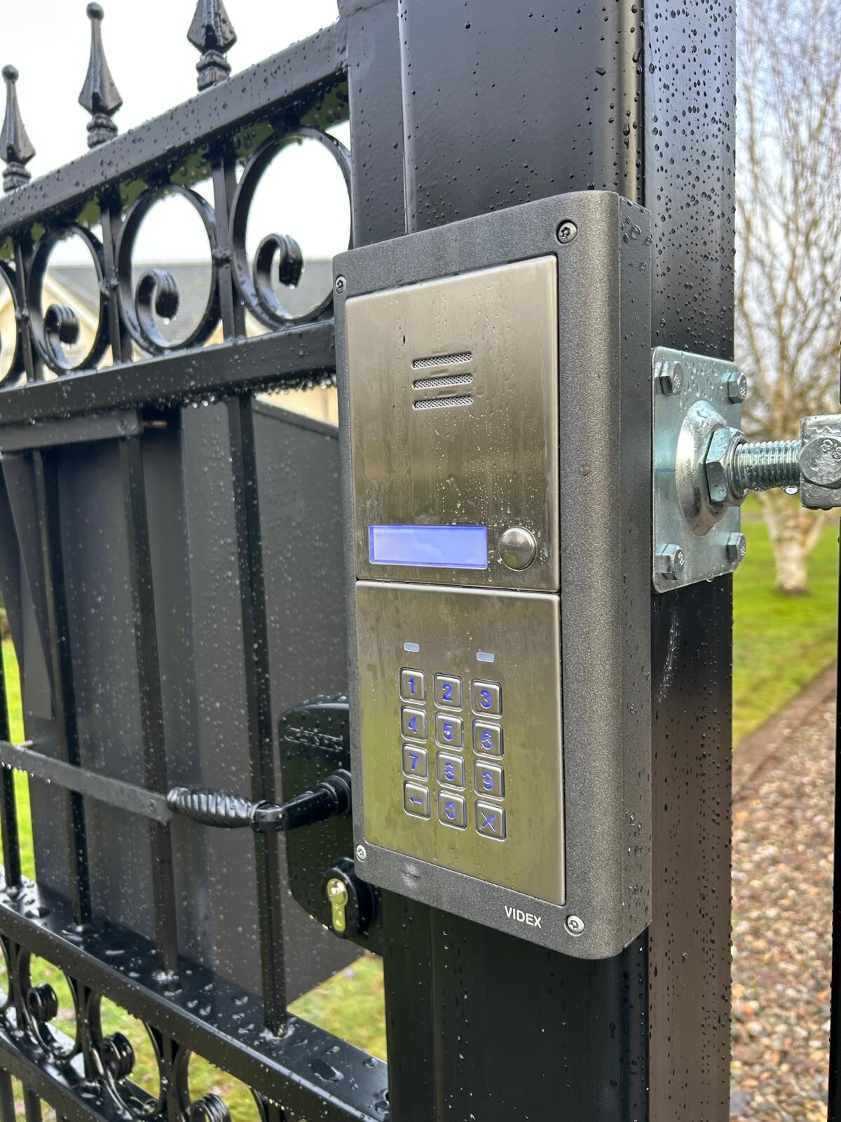 Videx intercom with backlit keypad fitted to a KLR Design electric swing gate installation