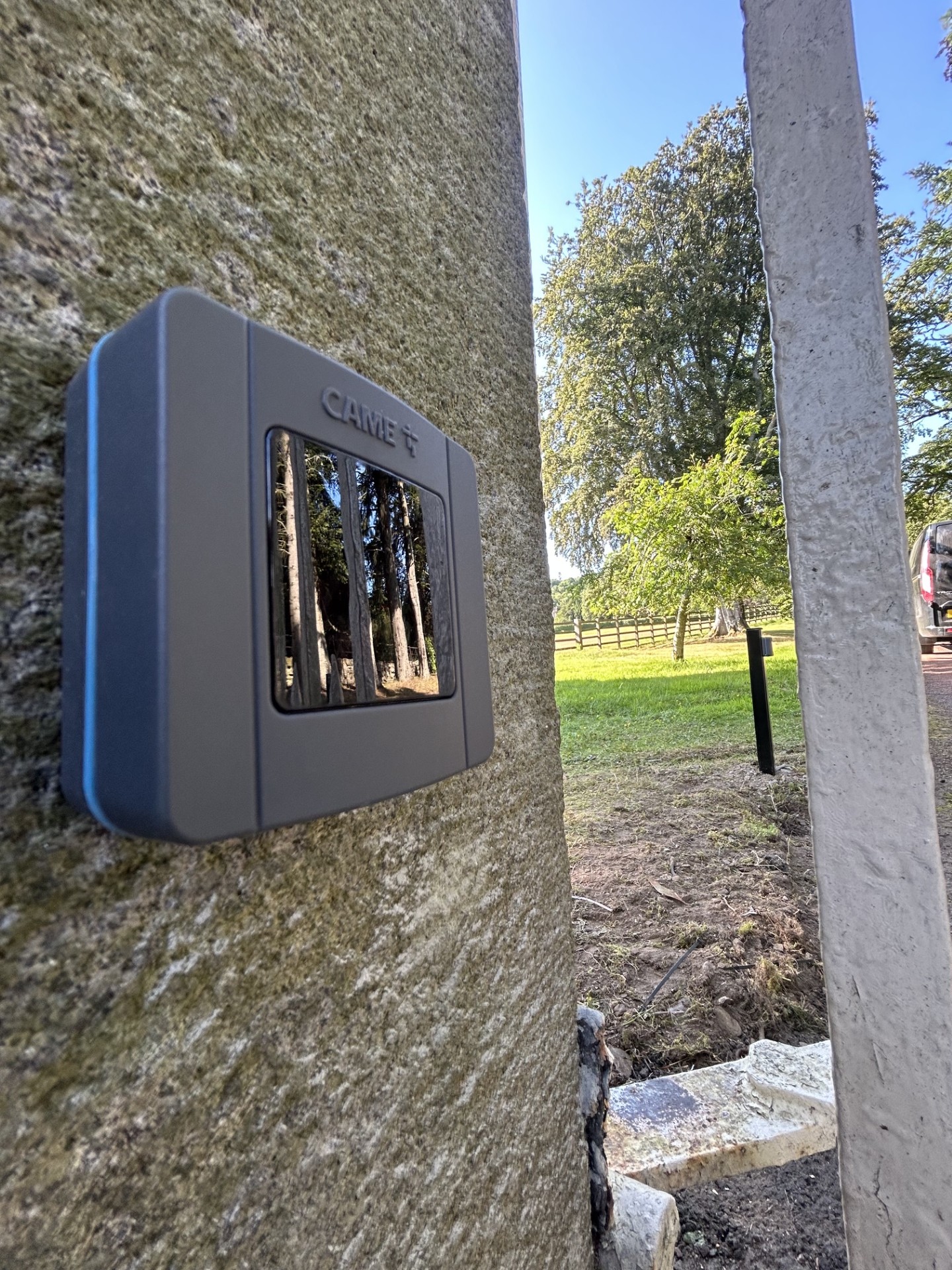 CAME access control keypad mounted on a stone gate pillar by KLR Design Limited
