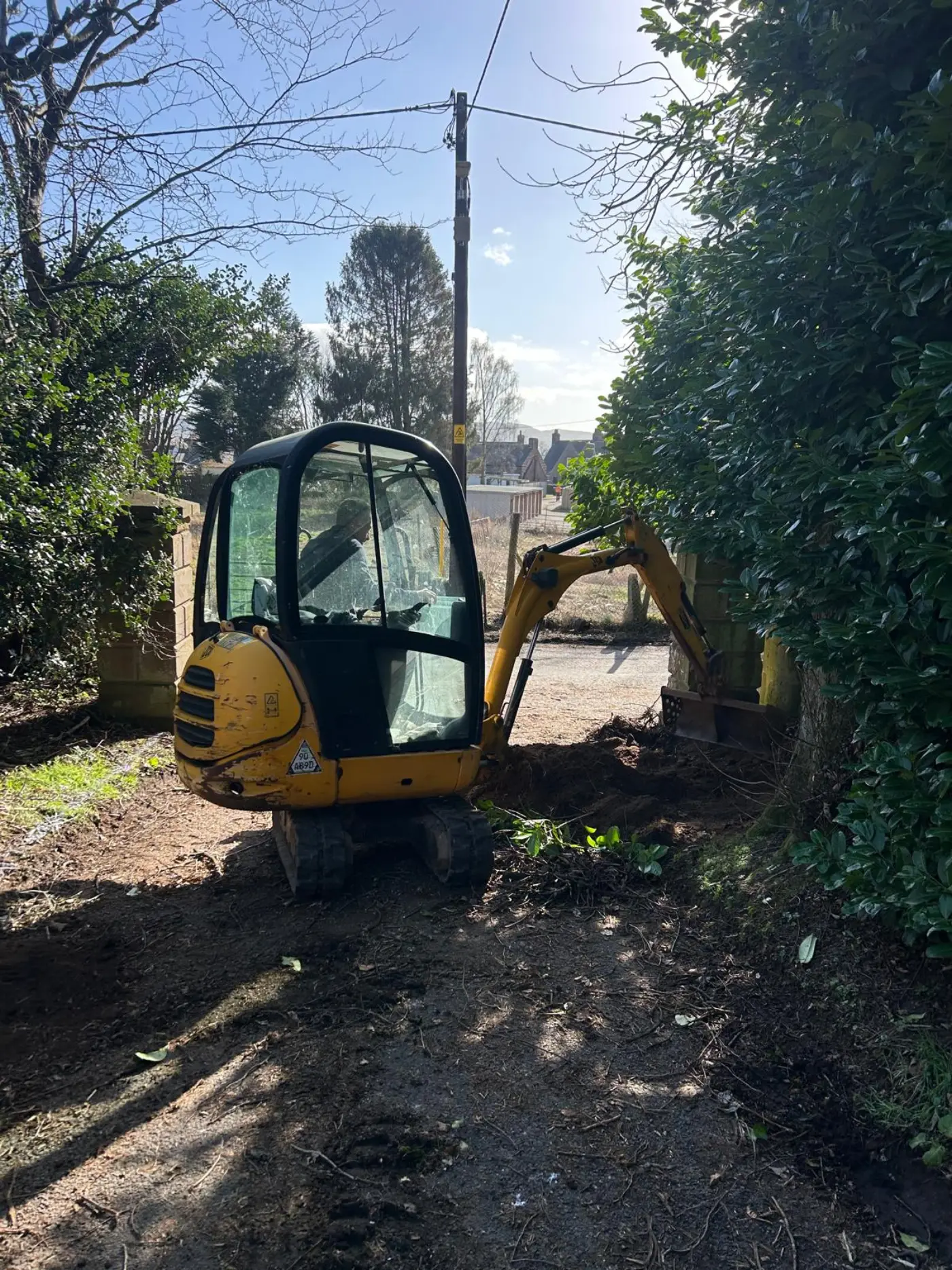 Mini excavator preparing the entrance for a new cantilever sliding gate in Coupar Angus