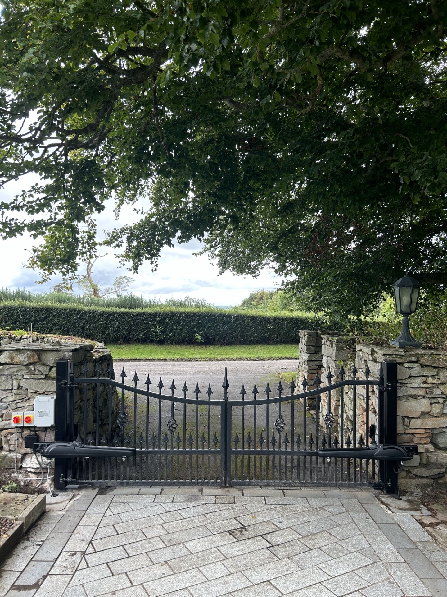 Automated wrought iron swing gates with DEA arm motors installed by KLR Design Limited, Scotland