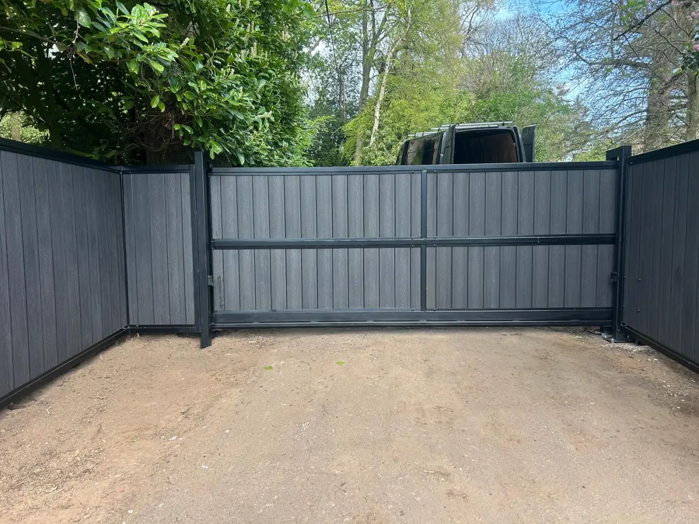 Commercial cantilever sliding gate with composite panels installed at Coupar Angus by KLR Design