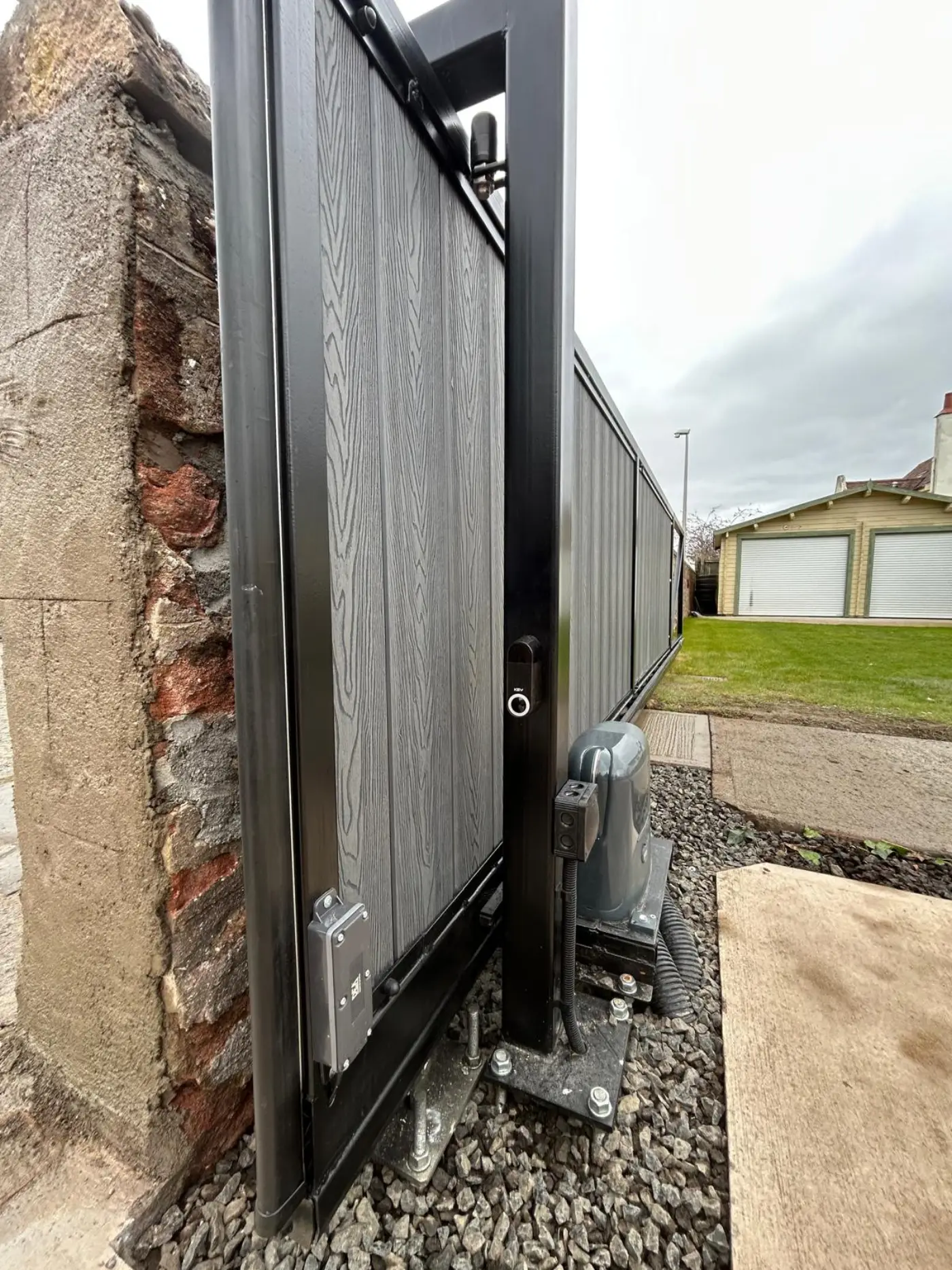 Safety edge and photocells on KLR Design cantilever sliding gate installation