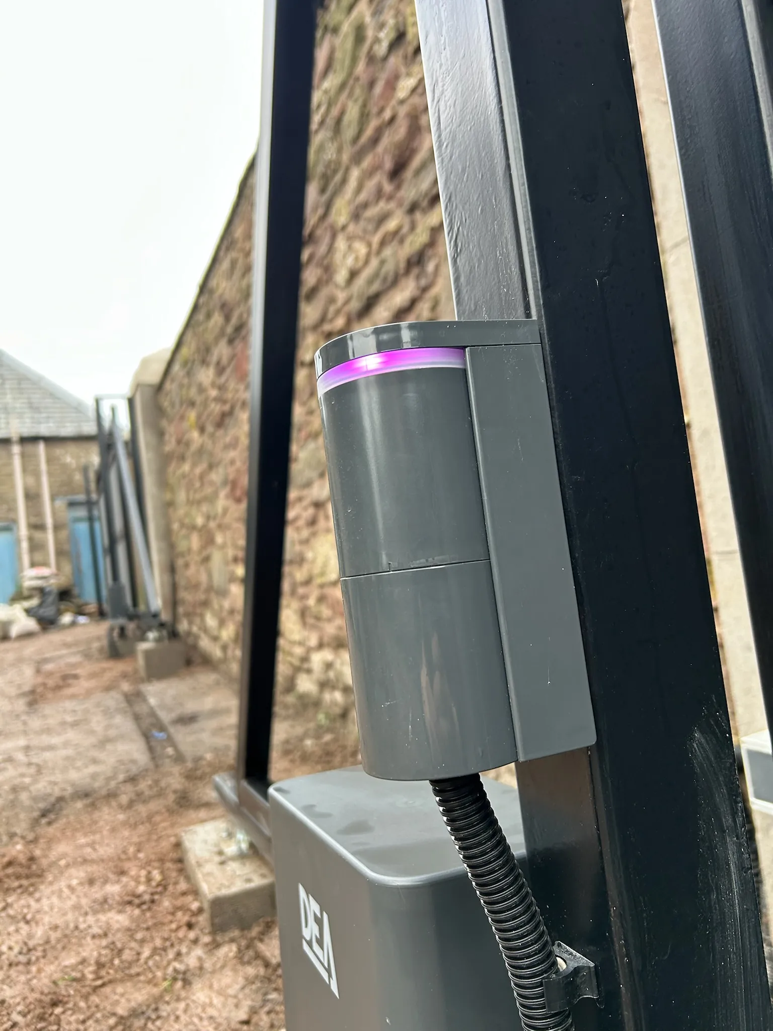 Illuminated AES Global keypad intercom on automatic electric gates in Scotland by KLR Design Limited