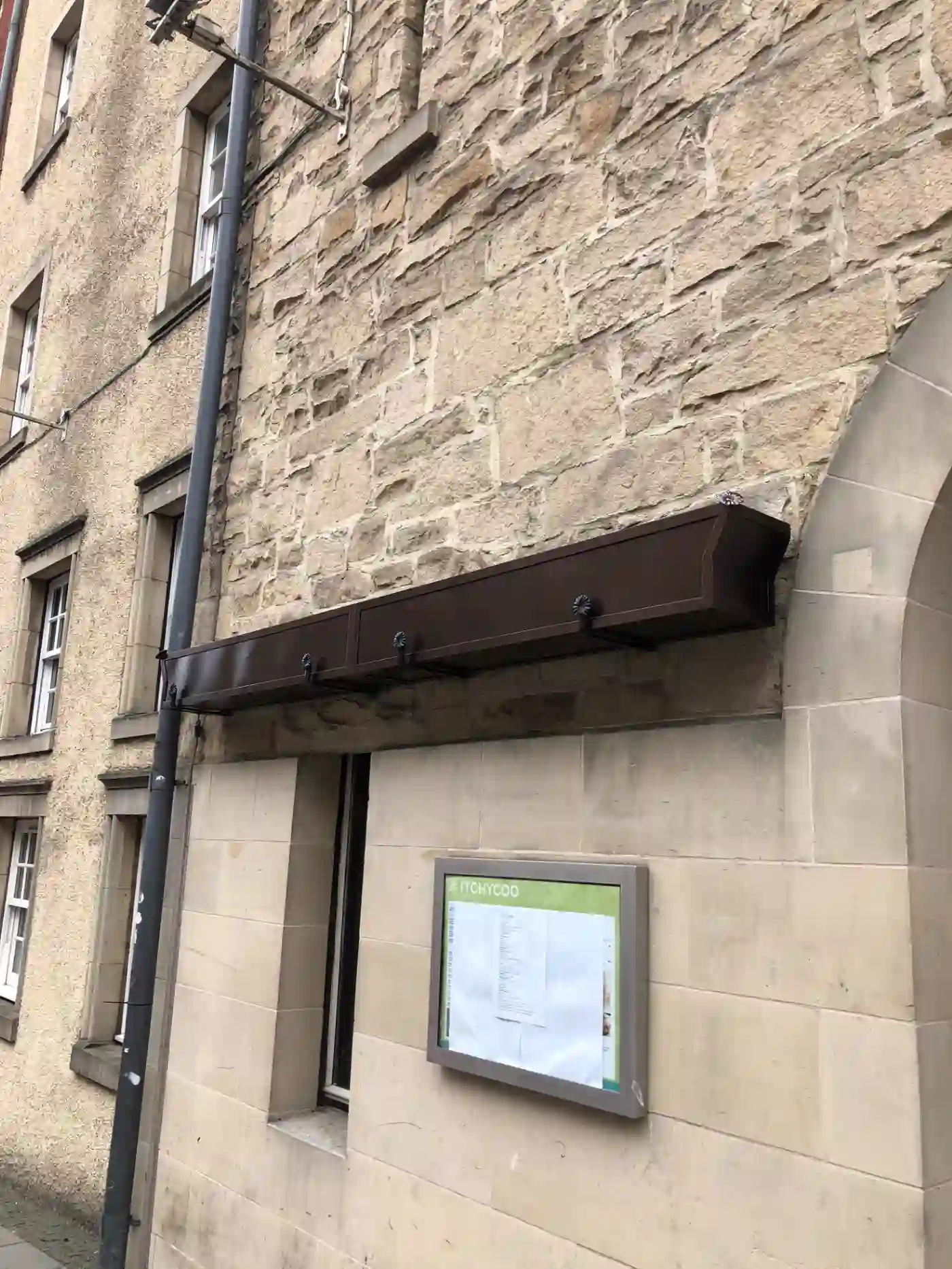 Decorative powder-coated canopy installed above Radisson Blu side entrance, Royal Mile Edinburgh