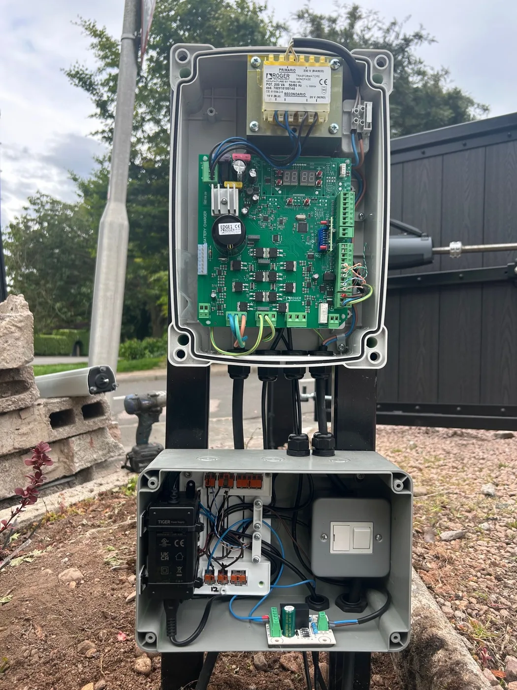Roger Technology electric gate control board and automation system installed by KLR Design Limited